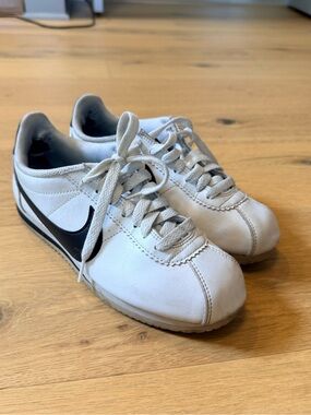 Nike White Sneakers with Black Swoosh